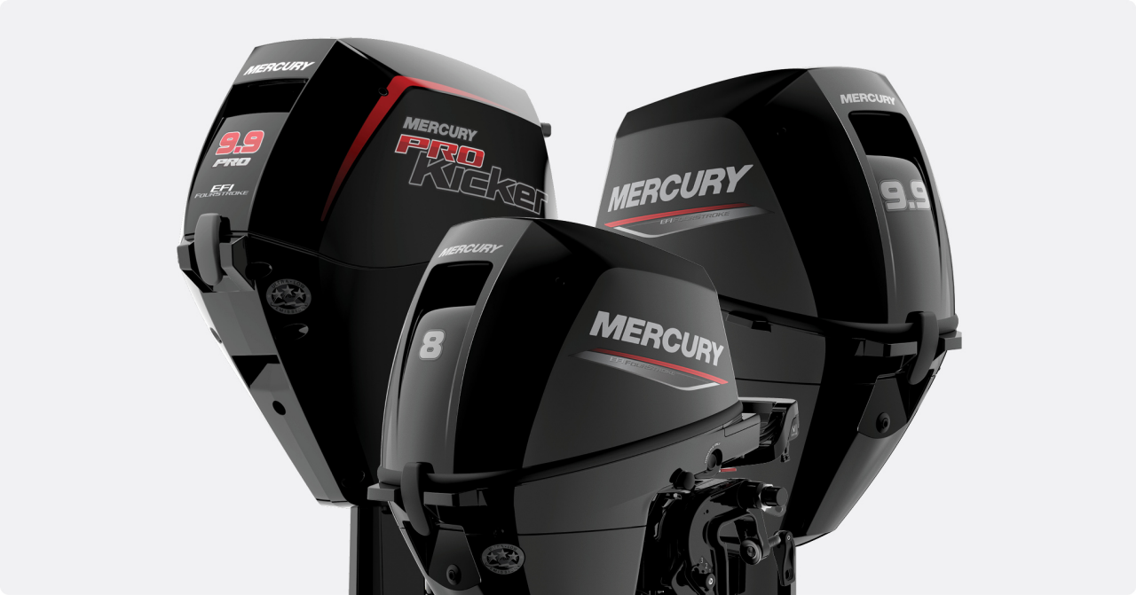 Suzuki and Mercury outboard motors lined up on display for boats and marine use