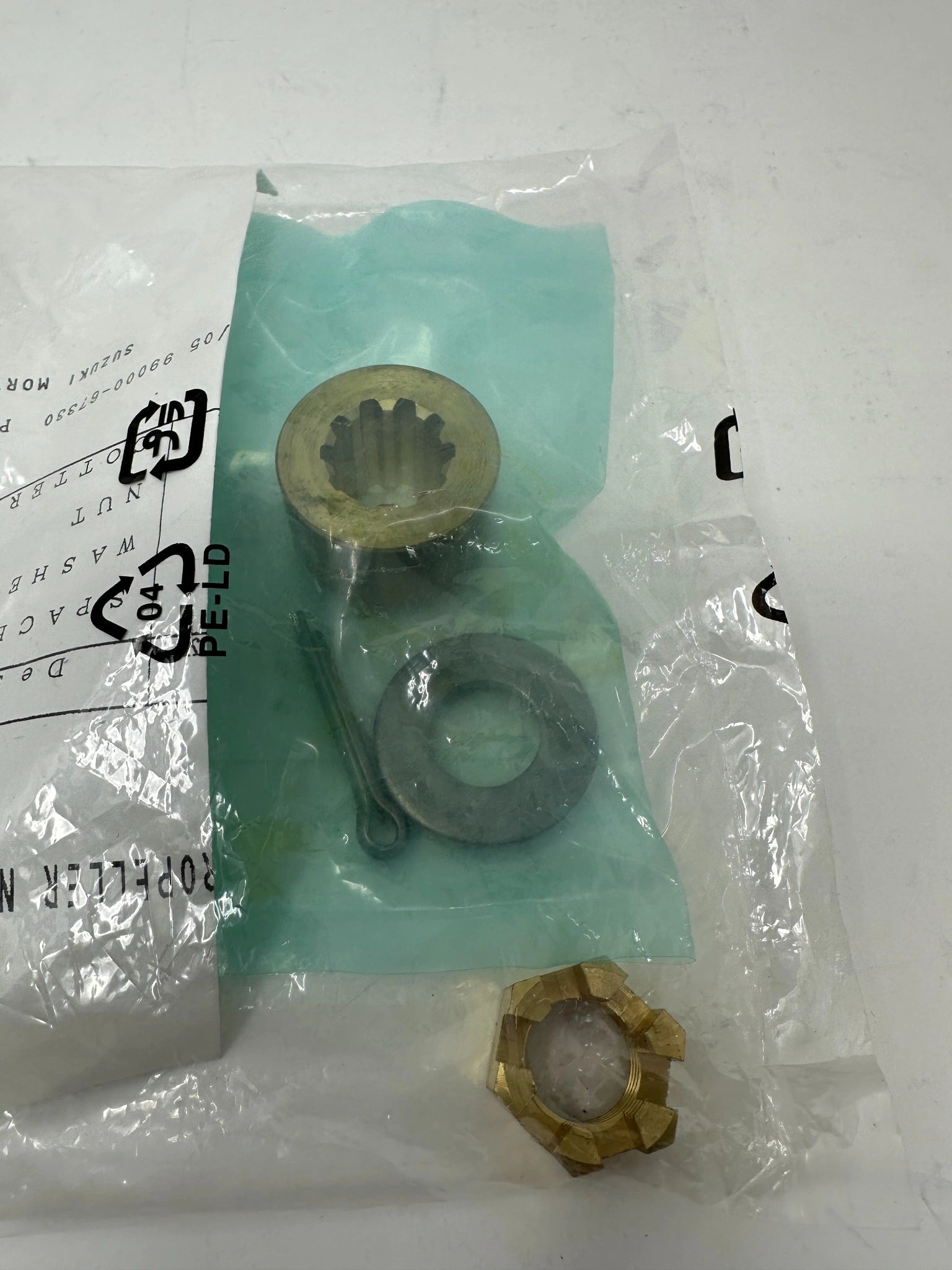 Suzuki 57630-96300 Propeller Hardware Kit DF25A DF30A Bag Back Closeup