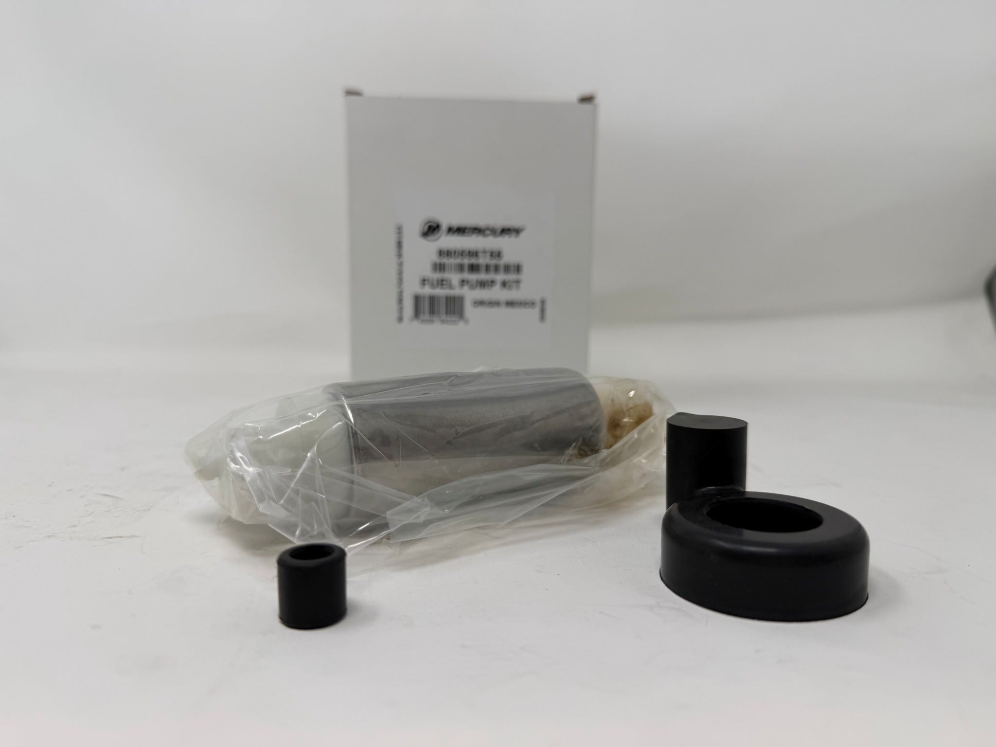 Mercury 880596T55 fuel pump kit close-up with grommet parts