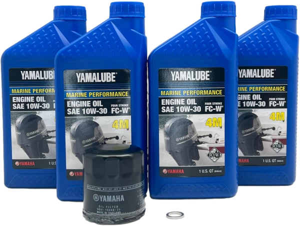Four bottles of Yamalube marine performance engine oil with a filter on a white background