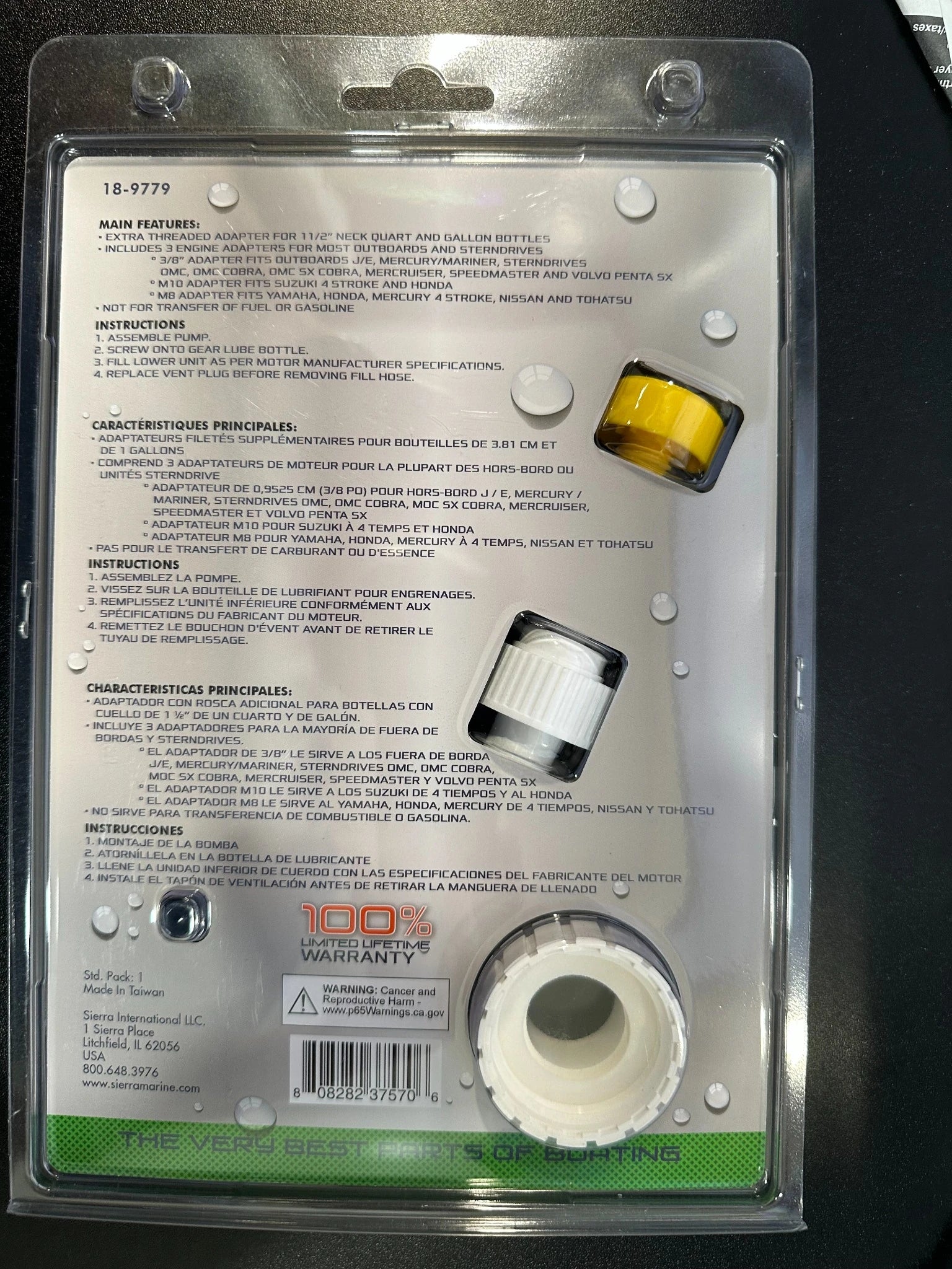 Sierra 18-9779 universal marine gear lube pump with transparent hose and metric adapters for quart bottles in package back.
